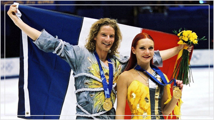 Марина Анисина и Гвендаль Пейзера с золотыми медалями Олимпиады.