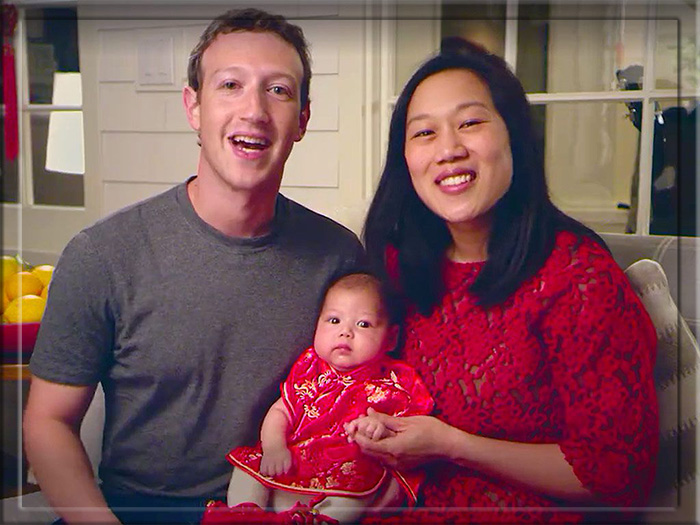 Марк Цукерберг с женой и первой дочерью.