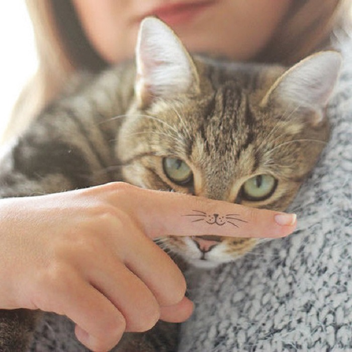 Значение татуировки кошачьи лапки