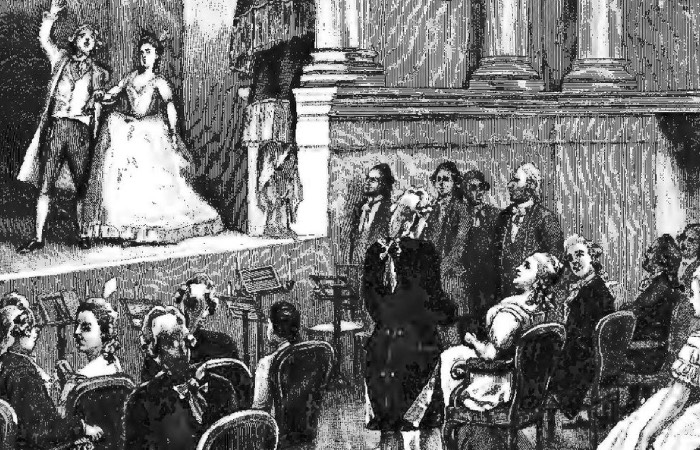 Александр справа от императрицы в театре.